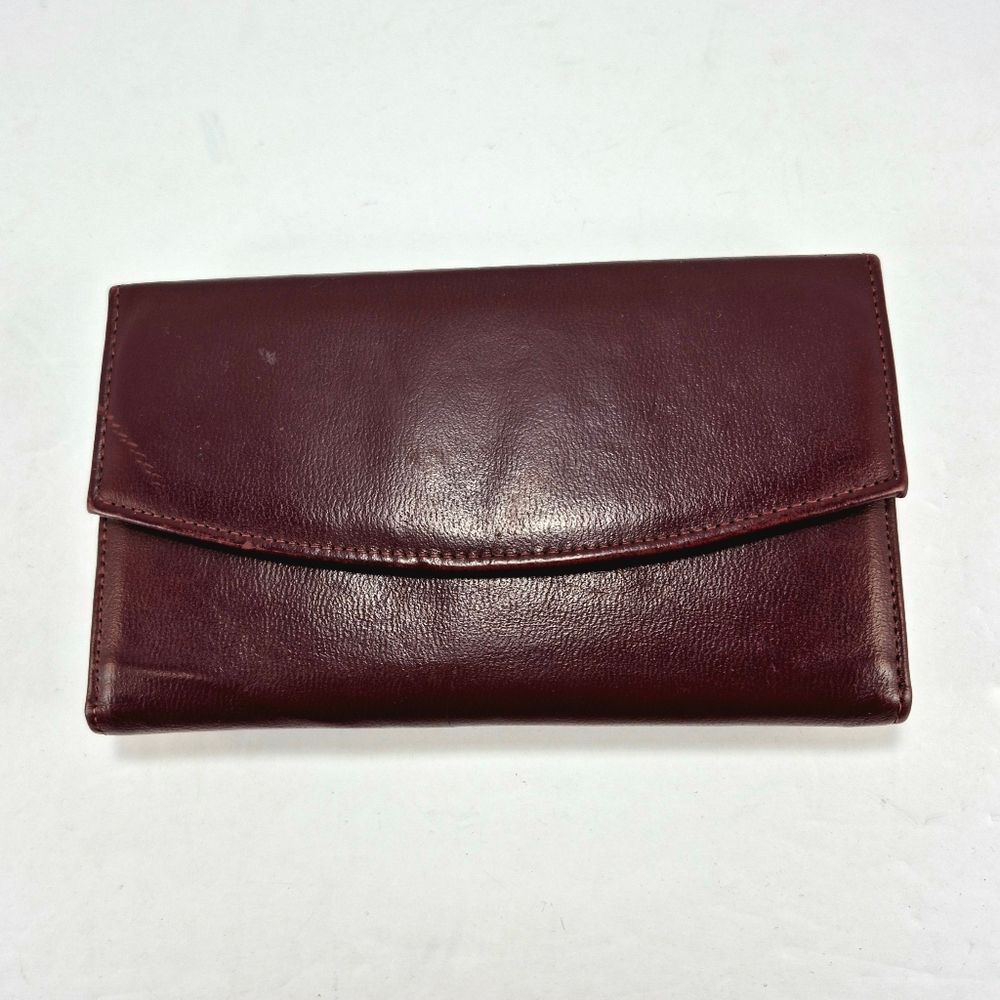 Vintage Full-Grain Cowhide Checkbook-Style Wallet With A Snap Closure.